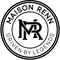 A circular black and white Maison Renn logo with the text 'MAISON RENN' around the top and 'DRIVEN BY LEGENDS' around the bottom, featuring an interlocking MR monogram in the center.